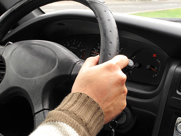 How does the steering wheel automatically returns to its center?